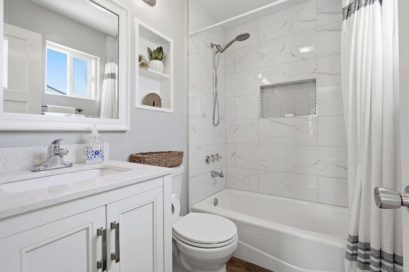 Less than two miles from the beach, the bay, and Liberty Station - photo 12