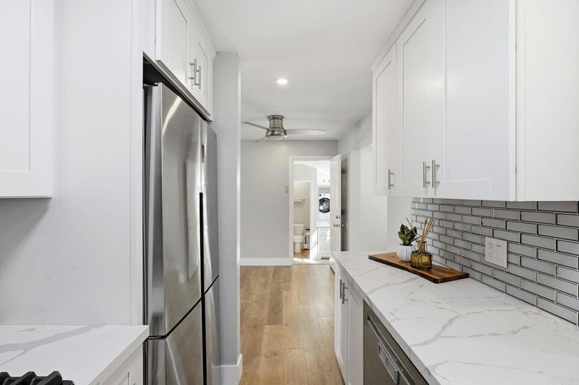 Less than two miles from the beach, the bay, and Liberty Station - photo 14