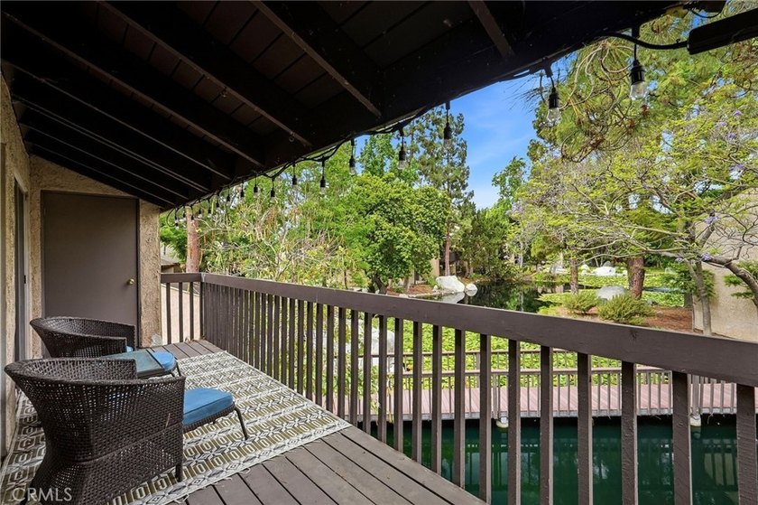 Welcome to this upper-level 2-bedroom, 2-bath condo offering 1 - photo 18