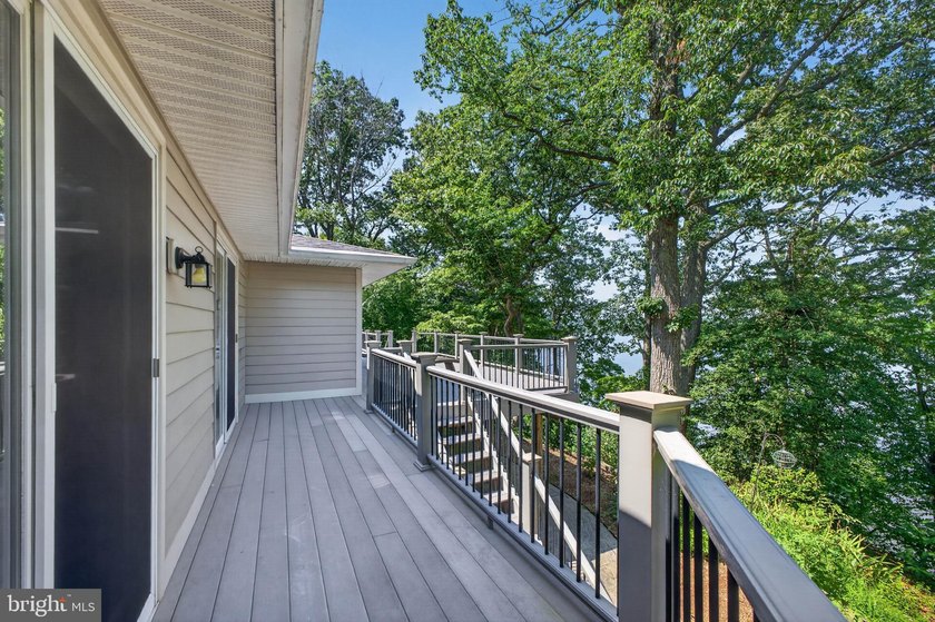Beautiful waterfront on nearly 7 acres. Spacious composite deck - photo 23