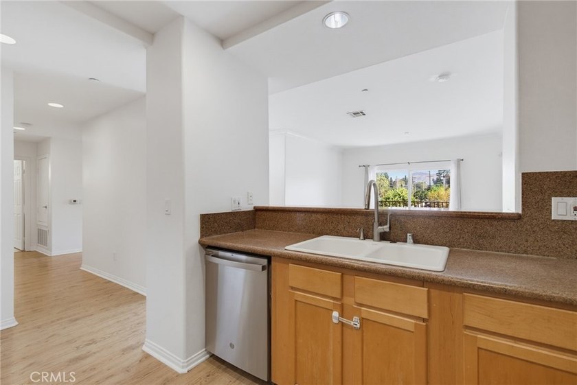 Welcome to this spacious 3-bedroom, 2.5-bath corner-unit - photo 11