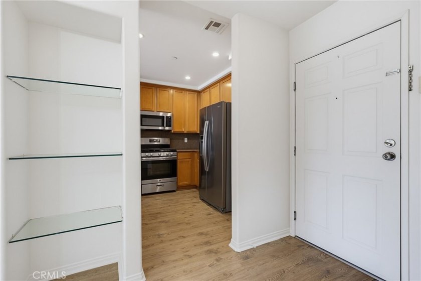 Welcome to this spacious 3-bedroom, 2.5-bath corner-unit - photo 12