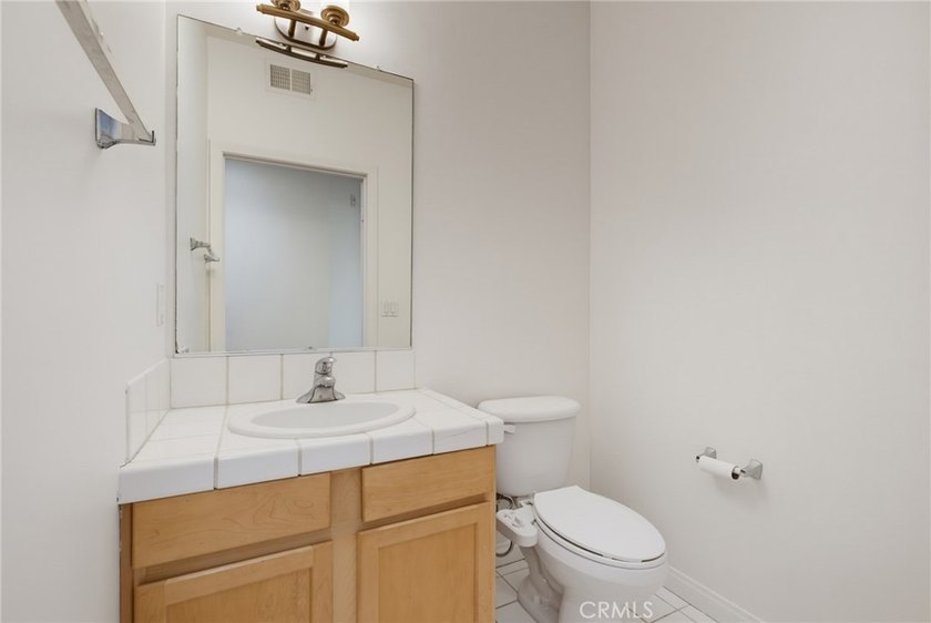 Welcome to this spacious 3-bedroom, 2.5-bath corner-unit - photo 14