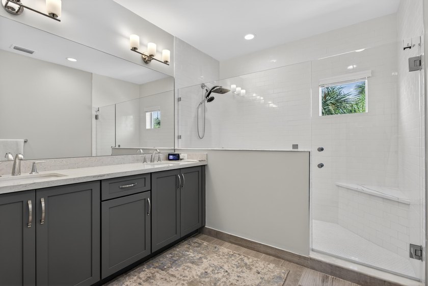 Beautifully upgraded 4BR / 2.5BA corner unit featuring an - photo 15