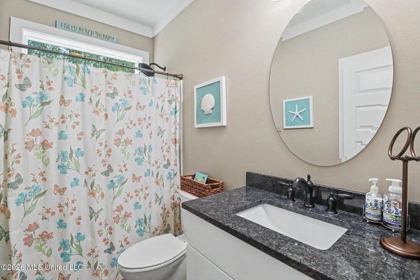 408 John Baptiste St, Bay St. Louis, MS Custom Living on a Rare - photo 19