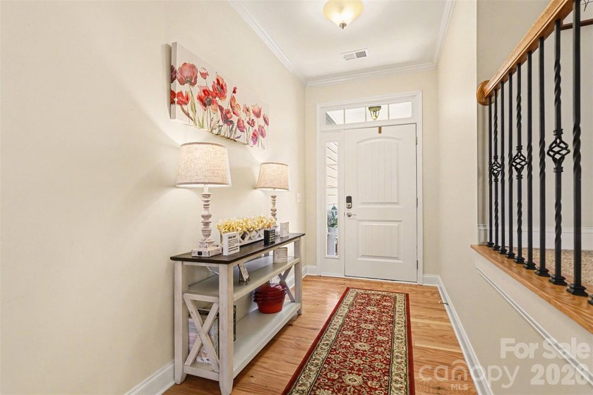 Welcome to one of the most desirable townhomes in charming - photo 4