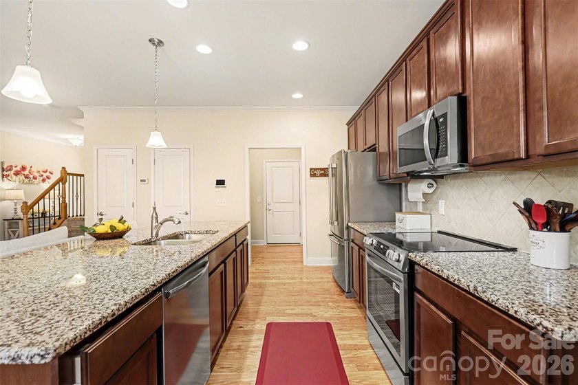 Welcome to one of the most desirable townhomes in charming - photo 9