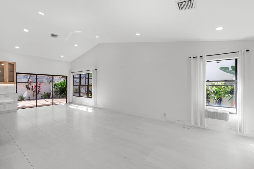 Welcome to refined living in this impeccably upgraded 3-bedroom - photo 11