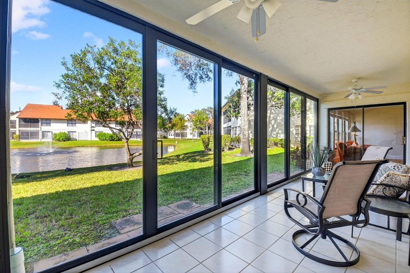 STUNNING LAKESIDE RENOVATION! 1st-floor condo offers expansive - photo 15