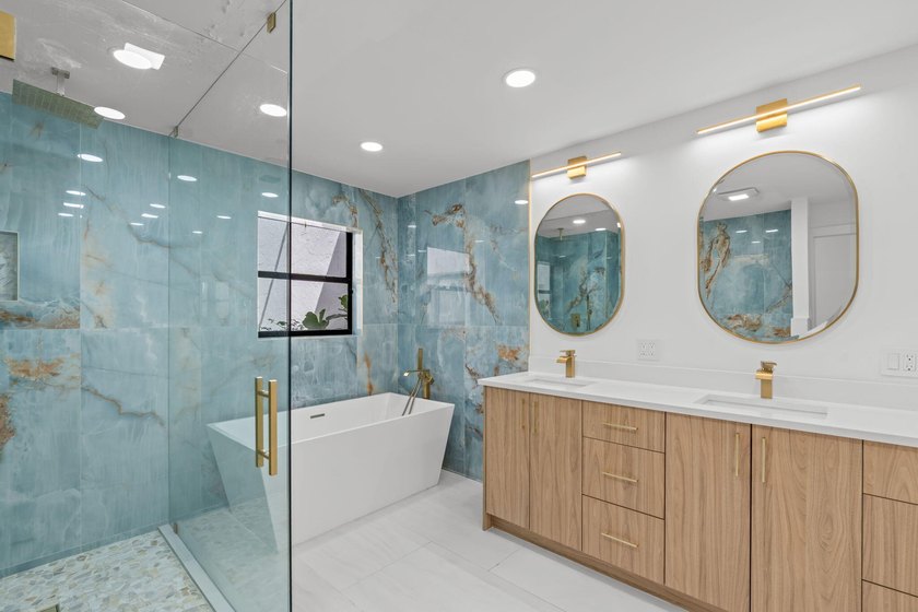 Welcome to refined living in this impeccably upgraded 3-bedroom - photo 17