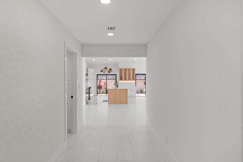 Welcome to refined living in this impeccably upgraded 3-bedroom - photo 19