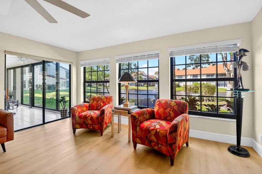 STUNNING LAKESIDE RENOVATION! 1st-floor condo offers expansive - photo 20