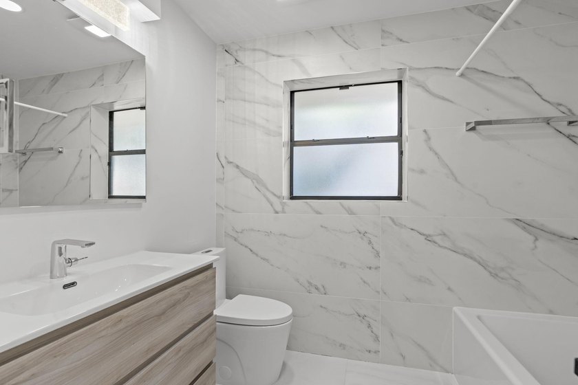 Welcome to refined living in this impeccably upgraded 3-bedroom - photo 21