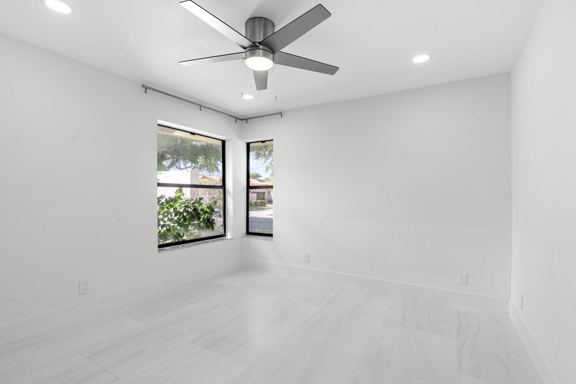 Welcome to refined living in this impeccably upgraded 3-bedroom - photo 22