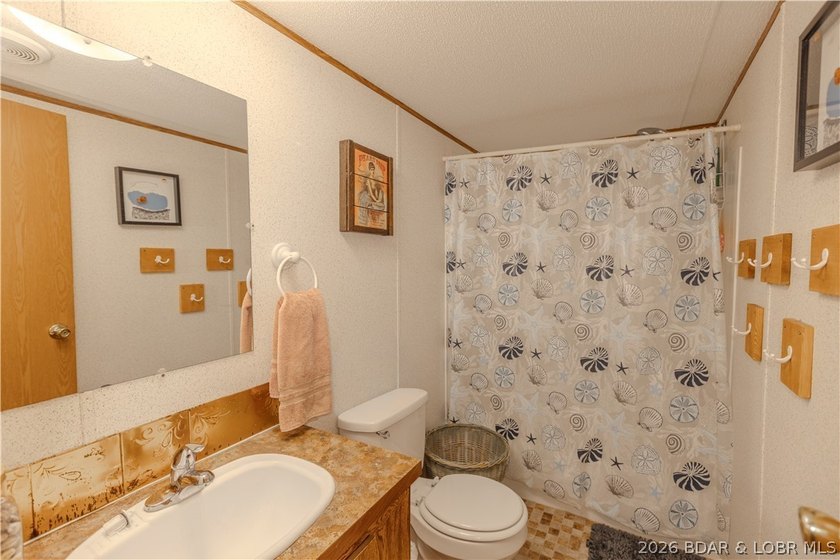 Peaceful lakefront living awaits. Tucked inside a protected - photo 31