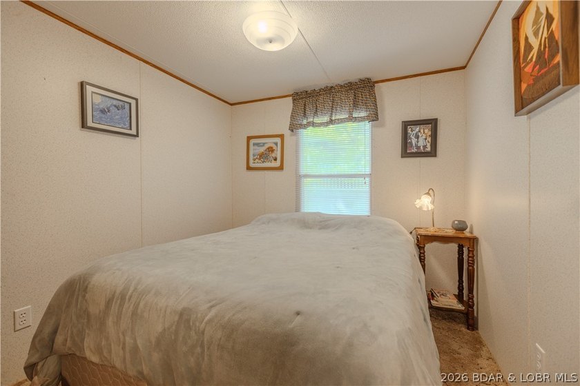 Peaceful lakefront living awaits. Tucked inside a protected - photo 33