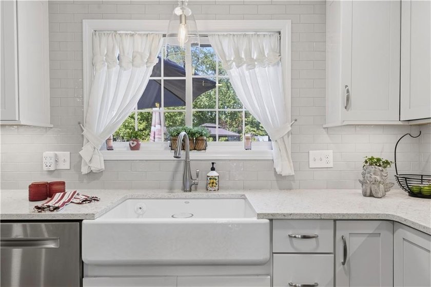 Welcome to this beautifully updated 4-bedroom, 3 full-bath - photo 15
