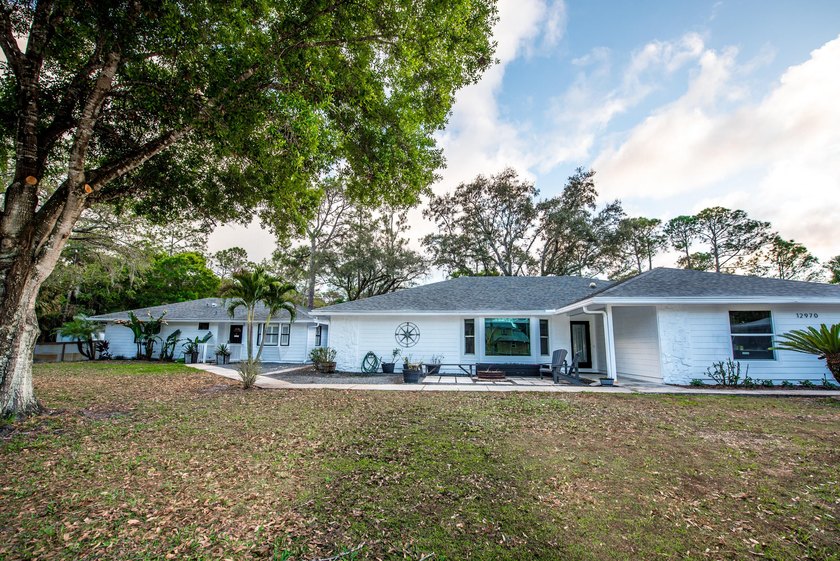 Fully upgraded Jupiter Farms retreat on 1.09 acres with NO HOA - photo 2