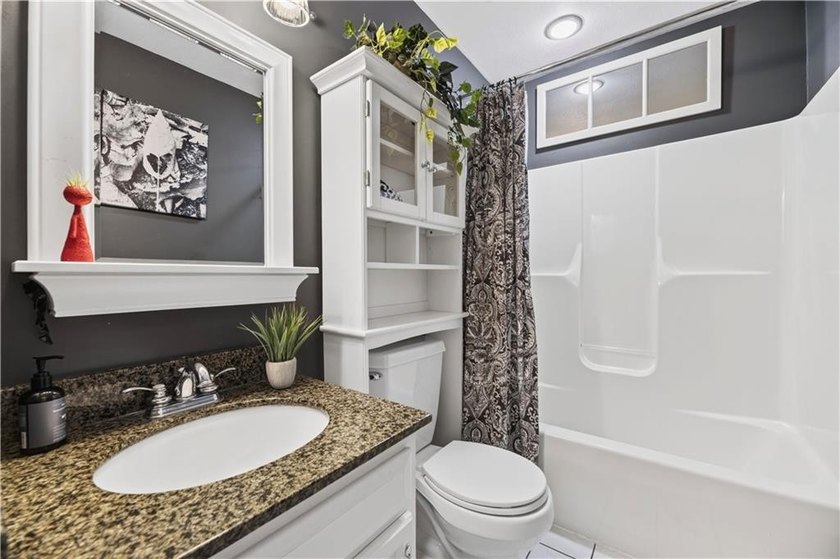 Welcome to this beautifully updated 4-bedroom, 3 full-bath - photo 25