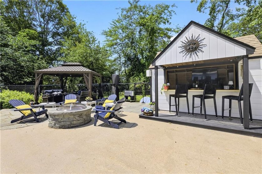 Welcome to this beautifully updated 4-bedroom, 3 full-bath - photo 43