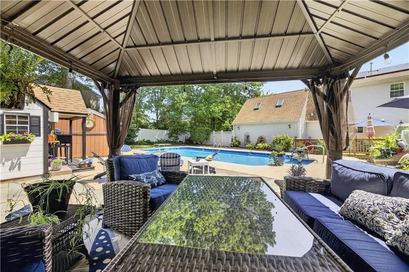 Welcome to this beautifully updated 4-bedroom, 3 full-bath - photo 47