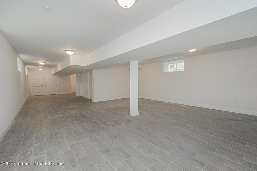 NEW CONSTRUCTION! Beautiful TWO family custom 6 over 6 home - photo 33