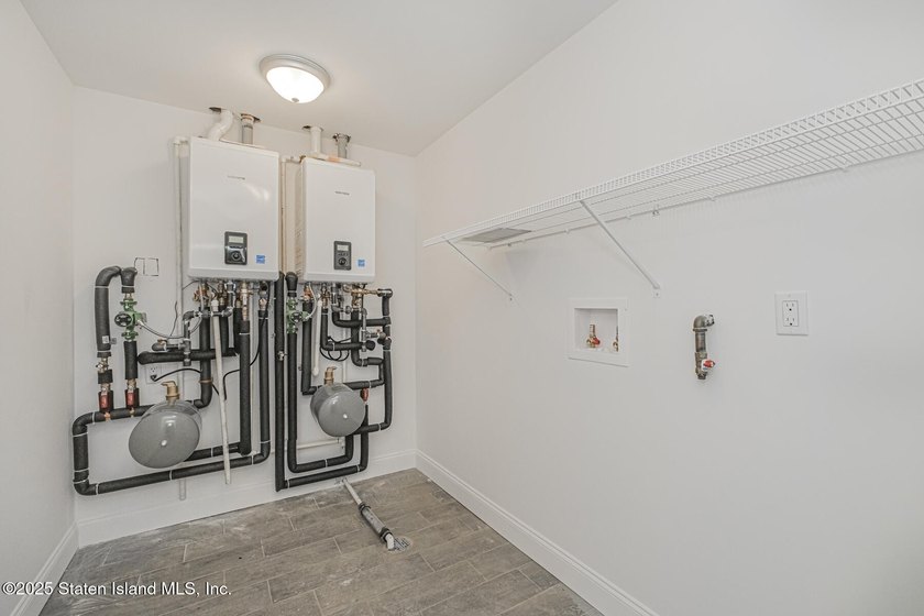 NEW CONSTRUCTION! Beautiful TWO family custom 6 over 6 home - photo 36
