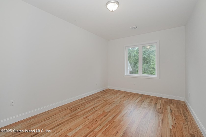 NEW CONSTRUCTION! Beautiful TWO family custom 6 over 6 home - photo 43