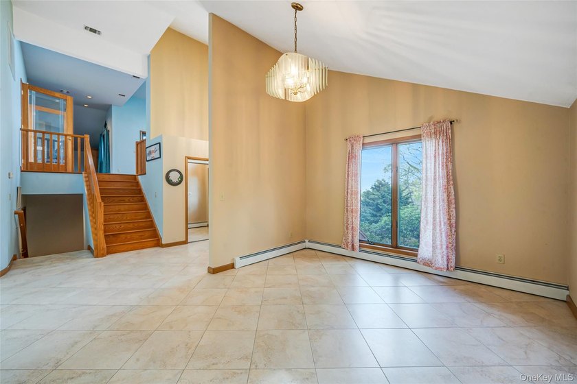 Set within the quiet Rolling Woods neighborhood on a shy acre at - photo 21
