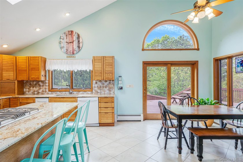Set within the quiet Rolling Woods neighborhood on a shy acre at - photo 23