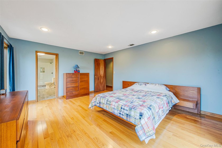 Set within the quiet Rolling Woods neighborhood on a shy acre at - photo 34