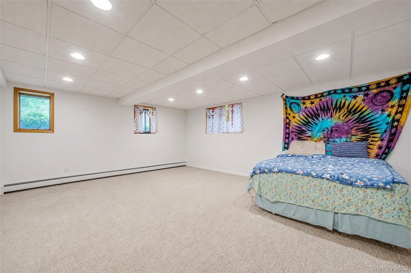 Set within the quiet Rolling Woods neighborhood on a shy acre at - photo 36