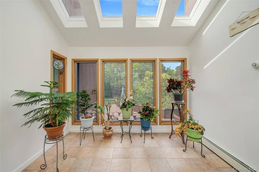 Set within the quiet Rolling Woods neighborhood on a shy acre at - photo 42