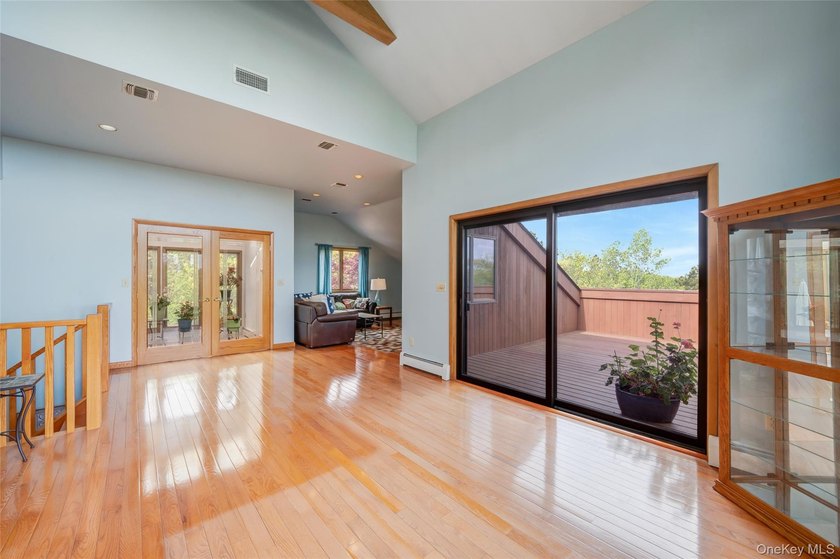 Set within the quiet Rolling Woods neighborhood on a shy acre at - photo 43