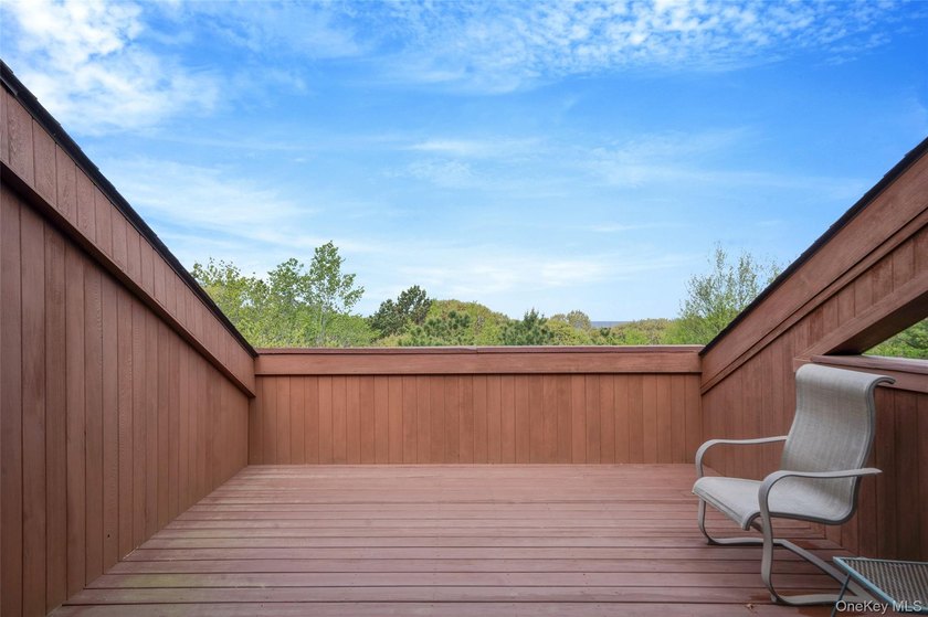 Set within the quiet Rolling Woods neighborhood on a shy acre at - photo 44
