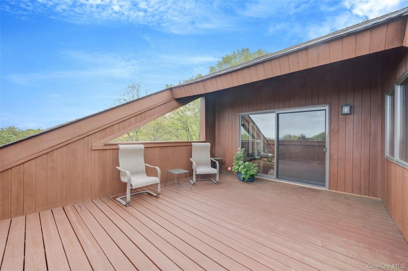 Set within the quiet Rolling Woods neighborhood on a shy acre at - photo 45