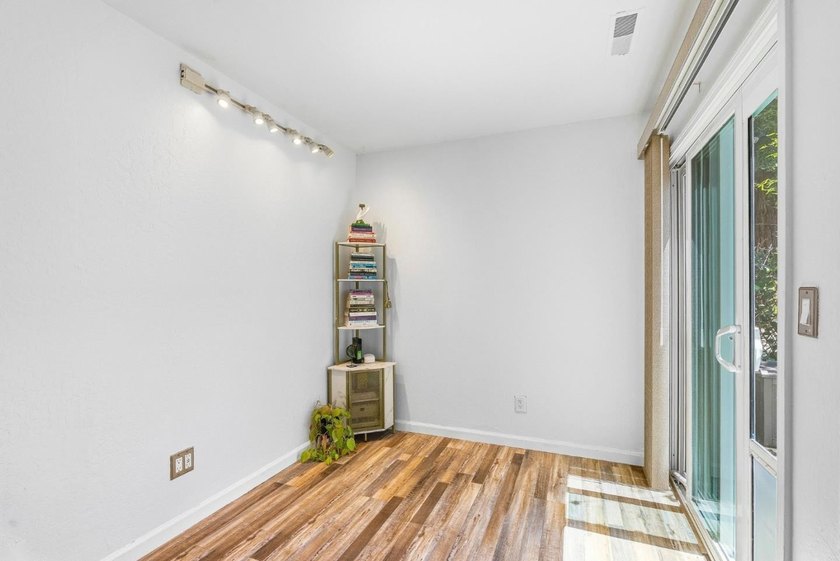 Tucked within a quiet Live Oak townhome community, this - photo 11