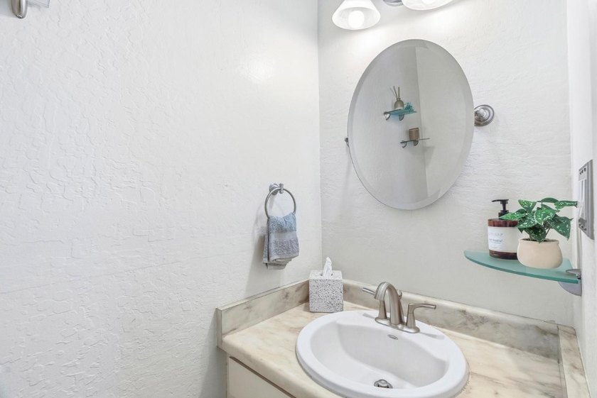 Tucked within a quiet Live Oak townhome community, this - photo 14