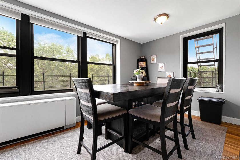 Welcome to this sprawling 3-bedroom, 2-bathroom corner unit in - photo 9