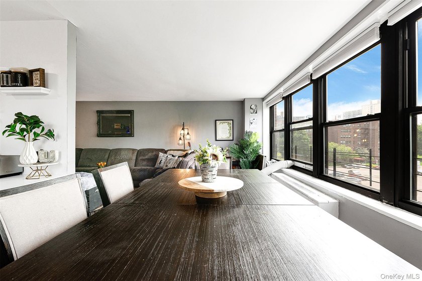 Welcome to this sprawling 3-bedroom, 2-bathroom corner unit in - photo 10