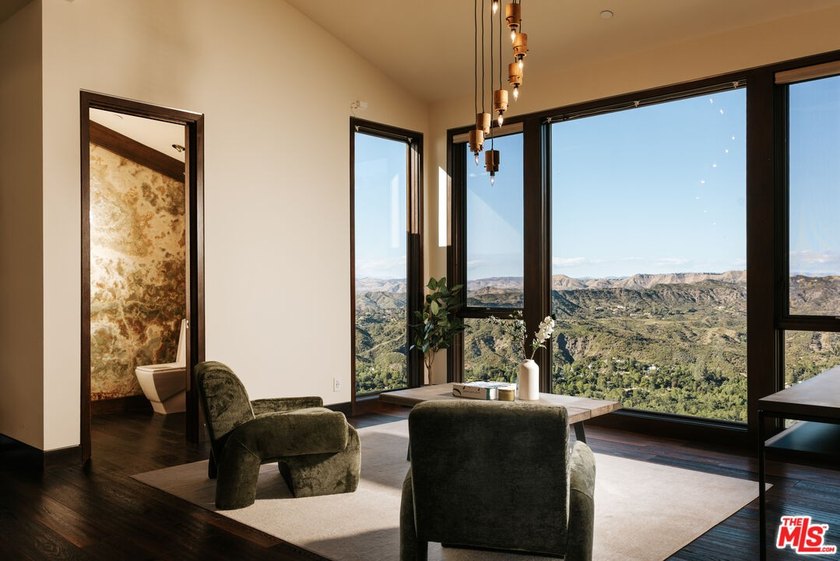 Perched on a private promontory deep within the Santa Monica - photo 13