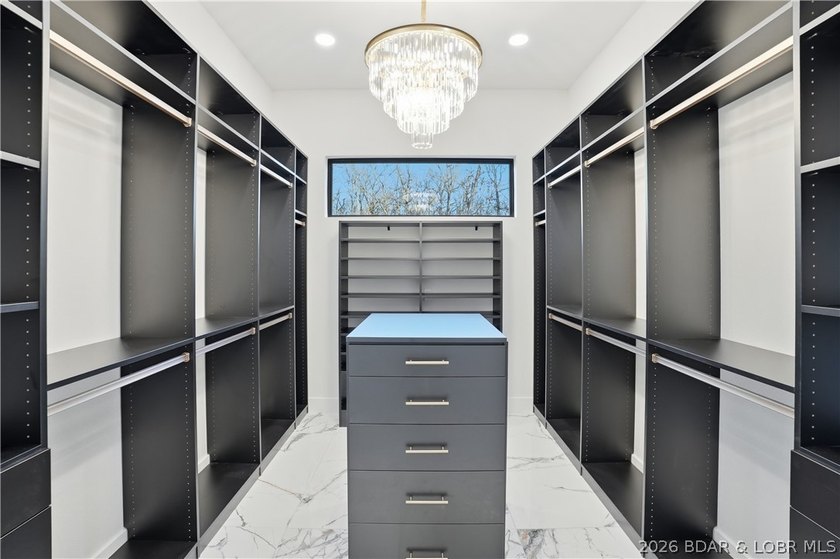 Welcome to your new modern retreat in Porto Cima. This stunning - photo 15