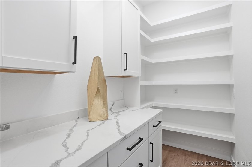 Welcome to your new modern retreat in Porto Cima. This stunning - photo 23