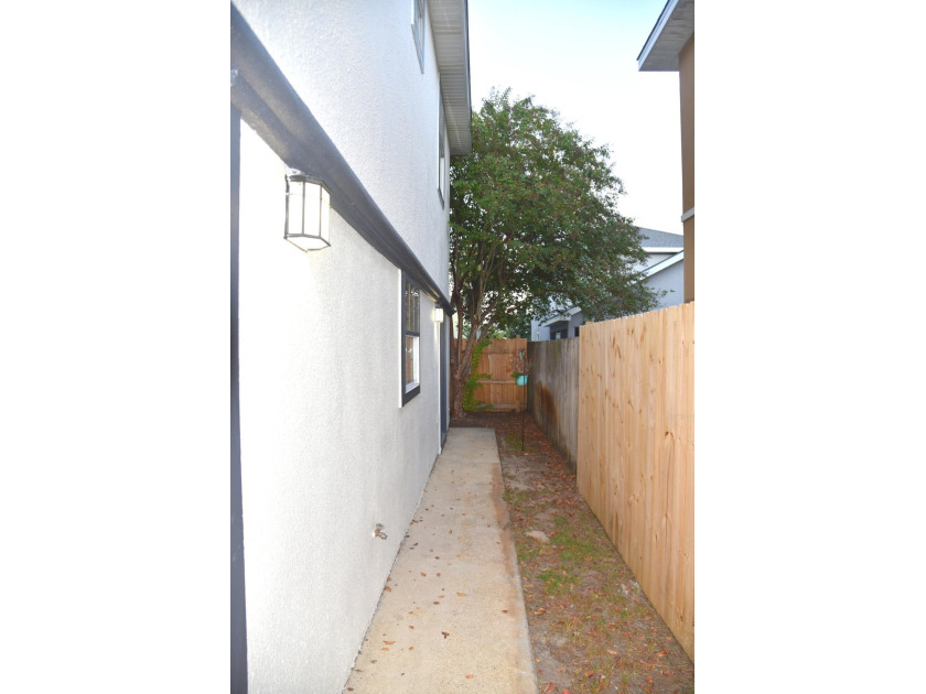 Welcome to this newly renovated coastal retreat which blends - photo 17