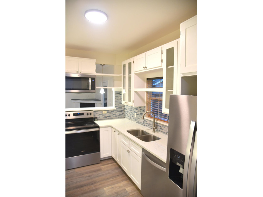 Welcome to this newly renovated coastal retreat which blends - photo 24
