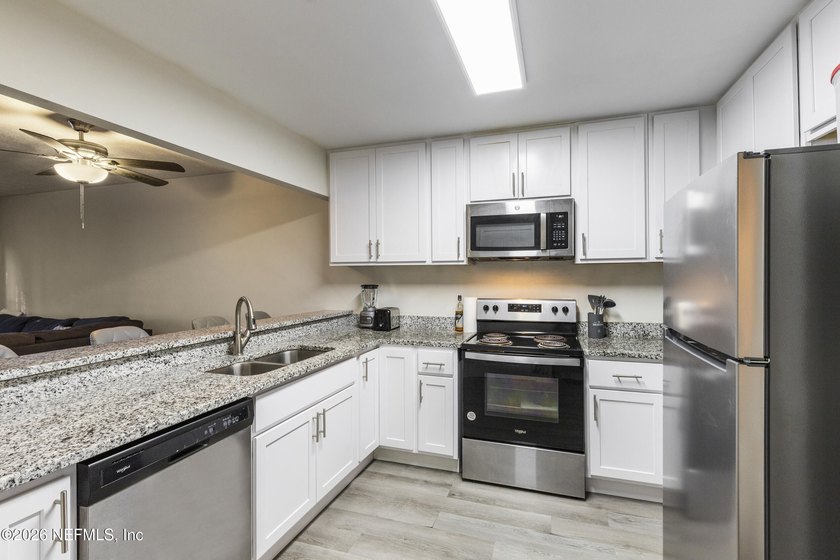 No HOA or CDD and ready to move in. This townhome has vinyl - photo 11