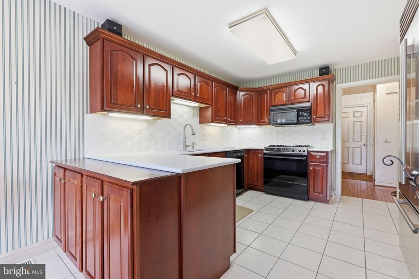 This is the one! Welcome to this beautiful end unit townhome - photo 18