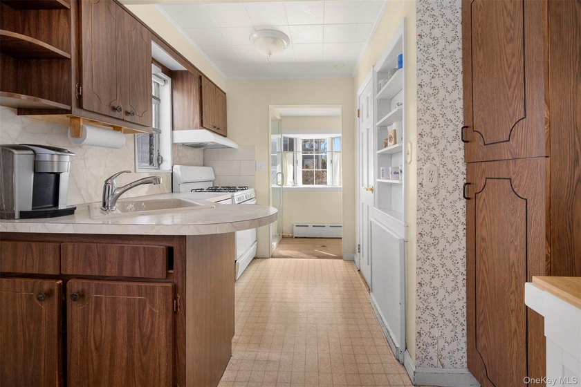 Welcome to this charming home nestled on a lovely tree-lined - photo 21