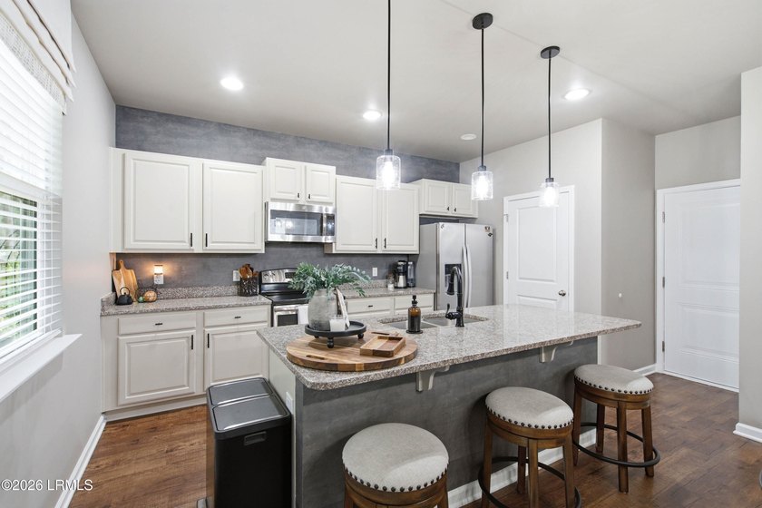 Welcome home to this meticulously maintained residence on - photo 24