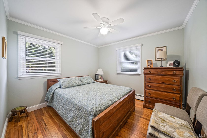 Nestled on a beautifully landscaped property surrounded by - photo 16